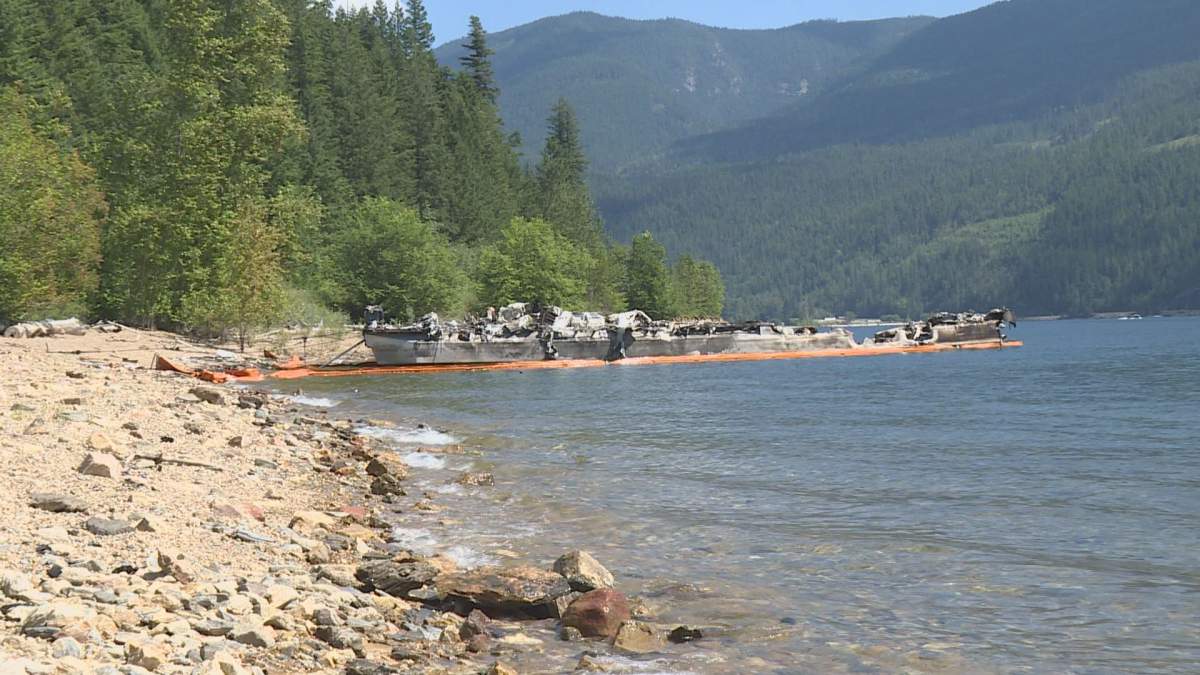 The aftermath of a houseboat fire on Mara Lake.