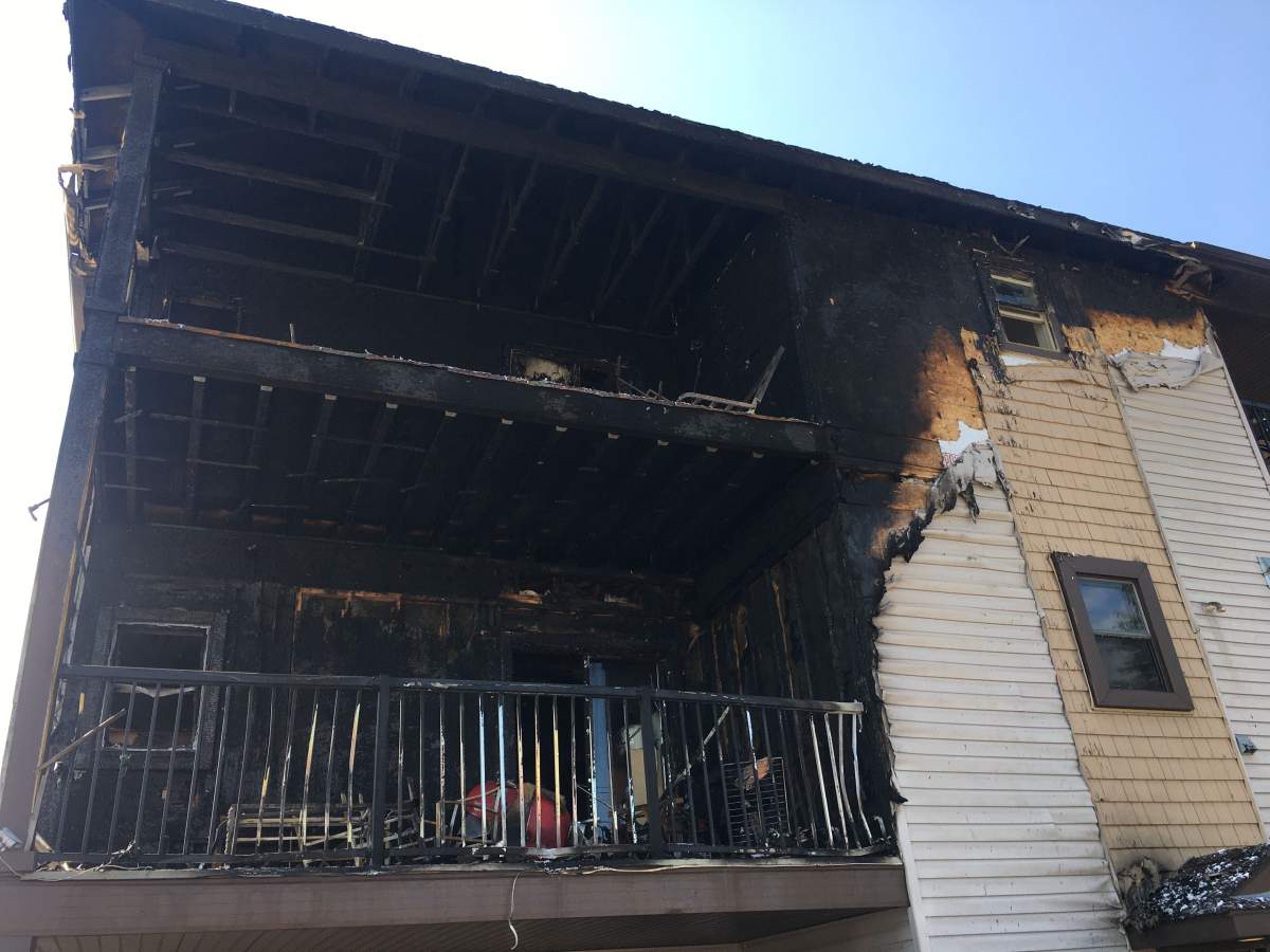 The aftermath of the Kensington apartment fire in Calgary on Sunday, Aug. 2, 2020, one day after the blaze.