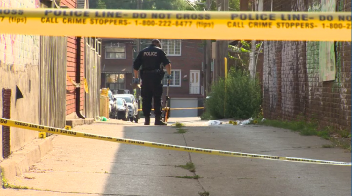 Police investigate a fatal stabbing in the area of Ossington Avenue and Dundas Street on Sunday.