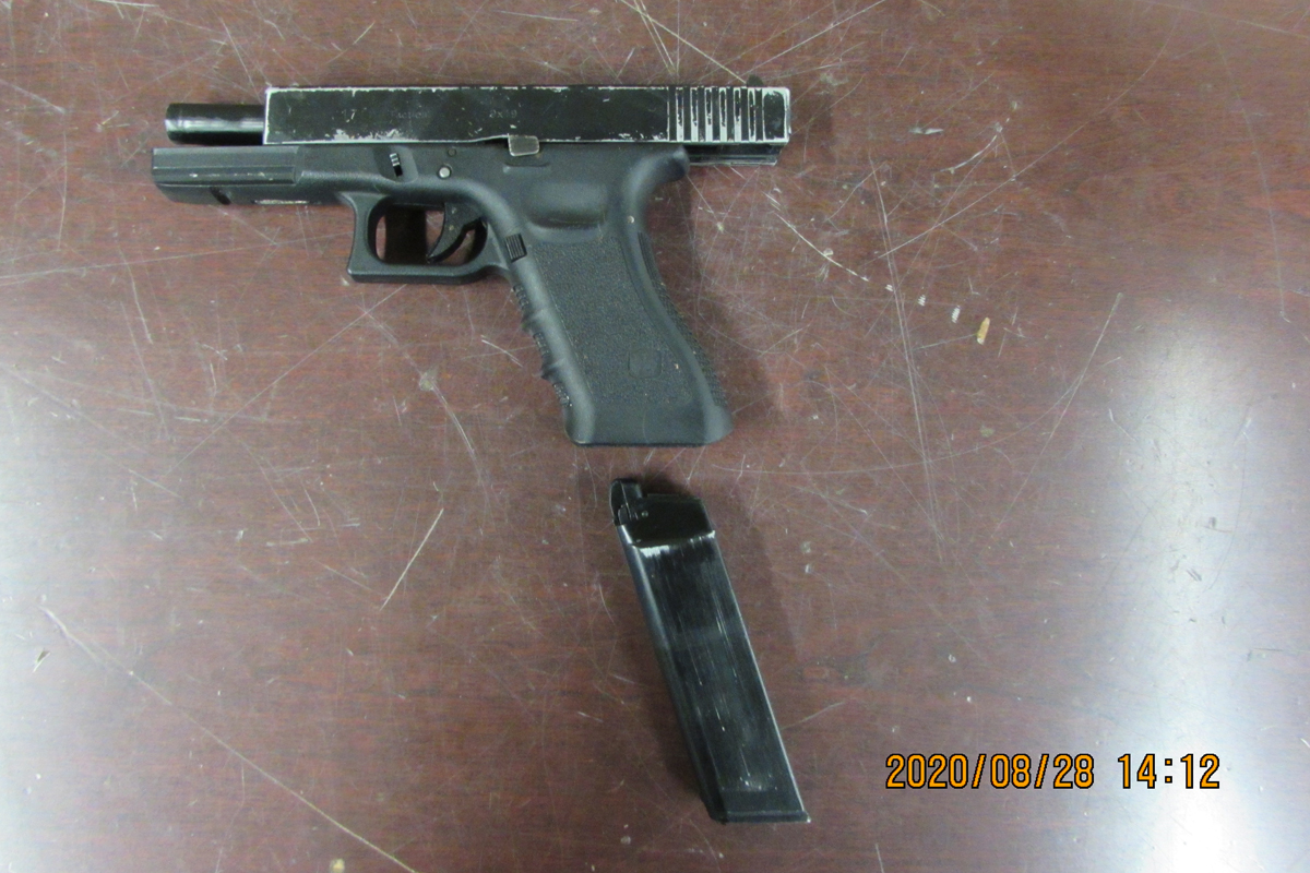 Waterloo Regional Police say they seized this handgun as part of the investigation.