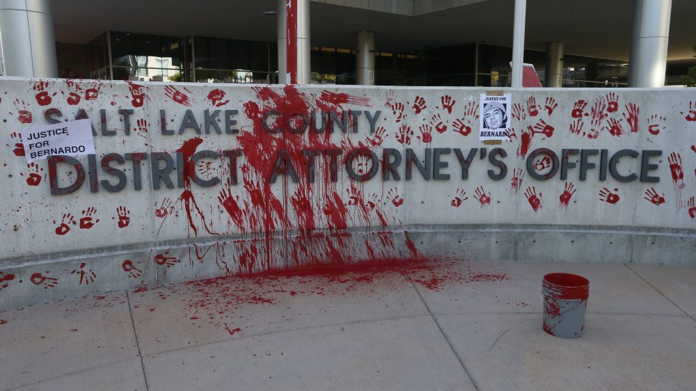 Protesters decrying the police shooting of Bernardo Palacios-Carbajal painted and marked the district attorney’s office on Thursday, July 9, 2020, in Salt Lake City.