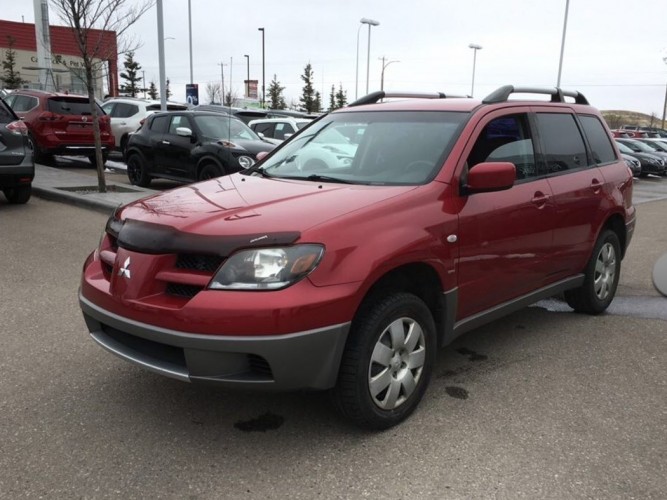 Calgary police are looking for a stolen 2003 Mitsubishi Outlander which had an original license plate that read BXD 1386. .