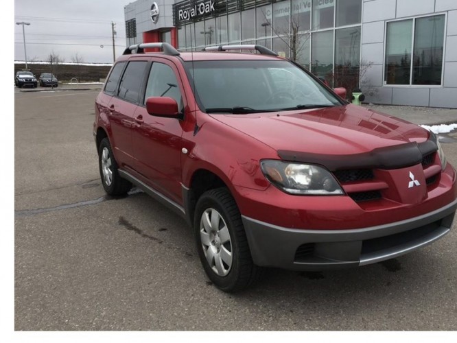 Calgary police are looking for a stolen 2003 Mitsubishi Outlander which had an original license plate that read BXD 1386.