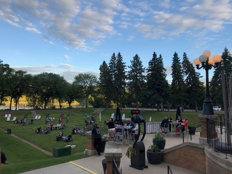Music fans gather near the South Saskatchewan River as Heidi Munro and Scott Patrick perform at the free “Summer Nights Series" on Aug. 15, 2020.