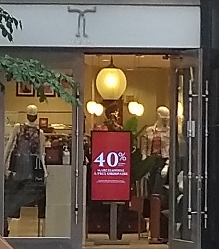 A Tristan storefront on Ste-Catherine Street in Montreal shows in-store discounts. Tuesday, Aug. 8, 2020.