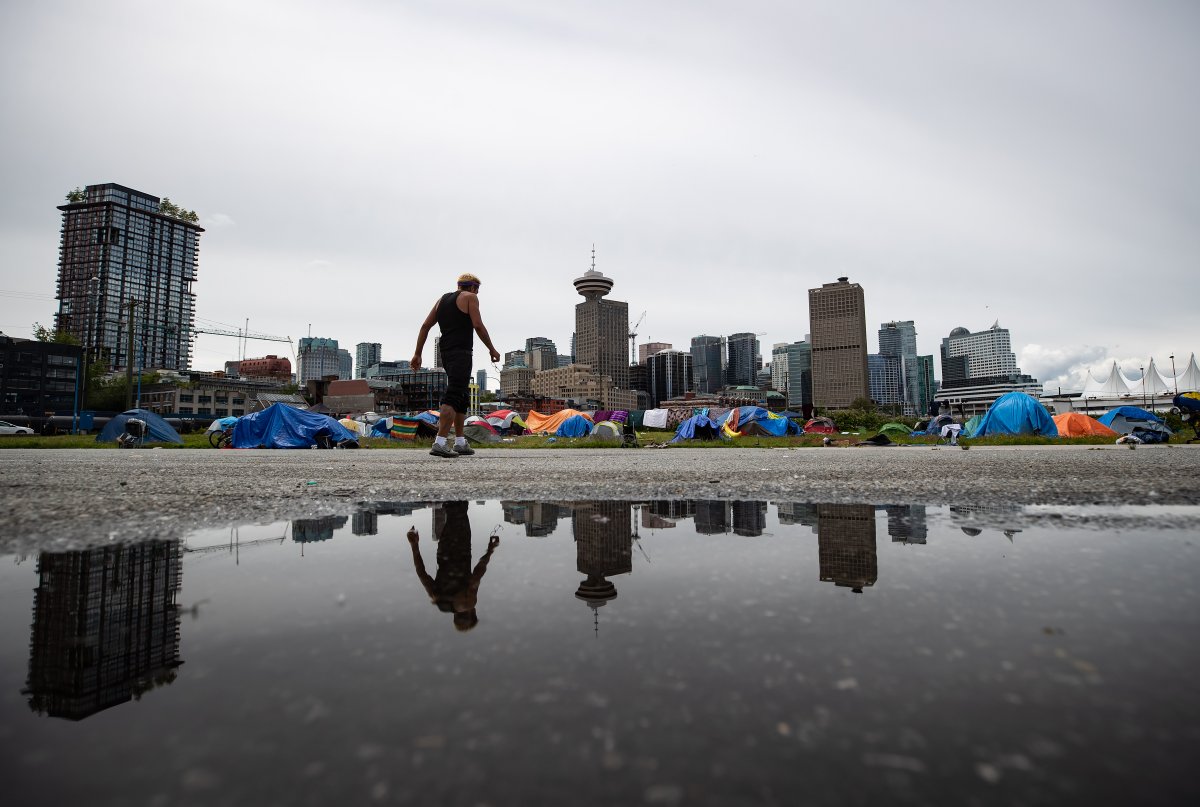 Residents of a Vancouver homeless camp near CRAB park before they were evicted from the federal Port of Vancouver land in June.