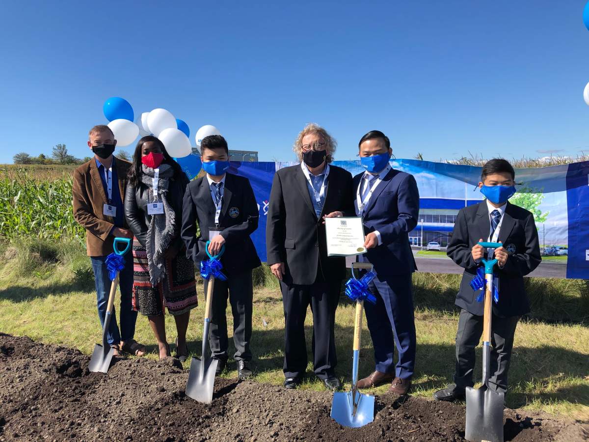 (From left to right): Councillor Shawn Lewis, Councillor Arielle Kayabaga, Andy Vo, Mayor Ed Holder, Tam Vo, and Peter Vo.
