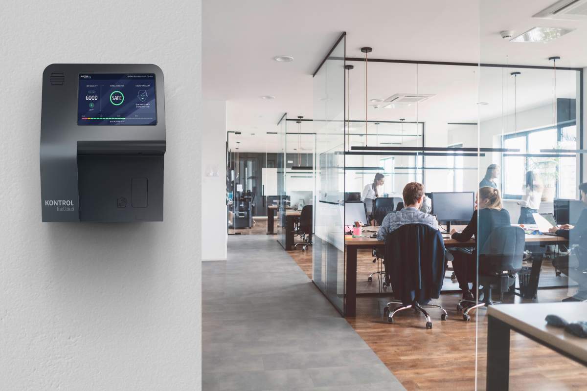 A mockup image shows a BioCloud device in an office setting testing for COVID-19 particles. 