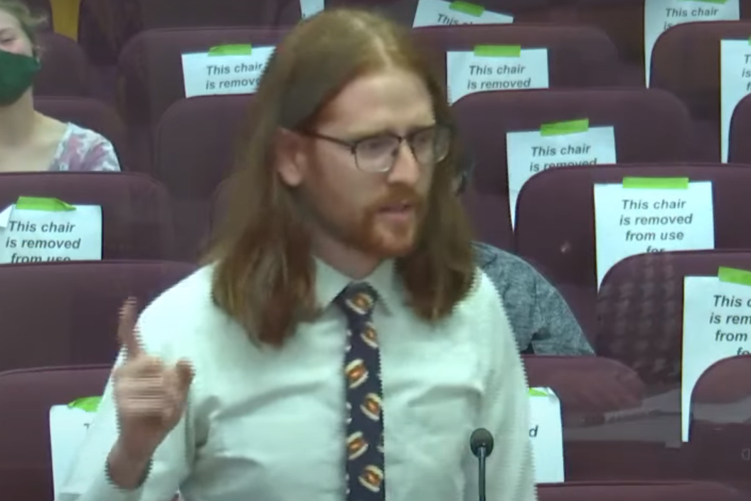 Ander Christensen, 27, delivers a passionate speech against boneless chicken wings during a council meeting in Lincoln, Neb., on Aug. 31, 2020.