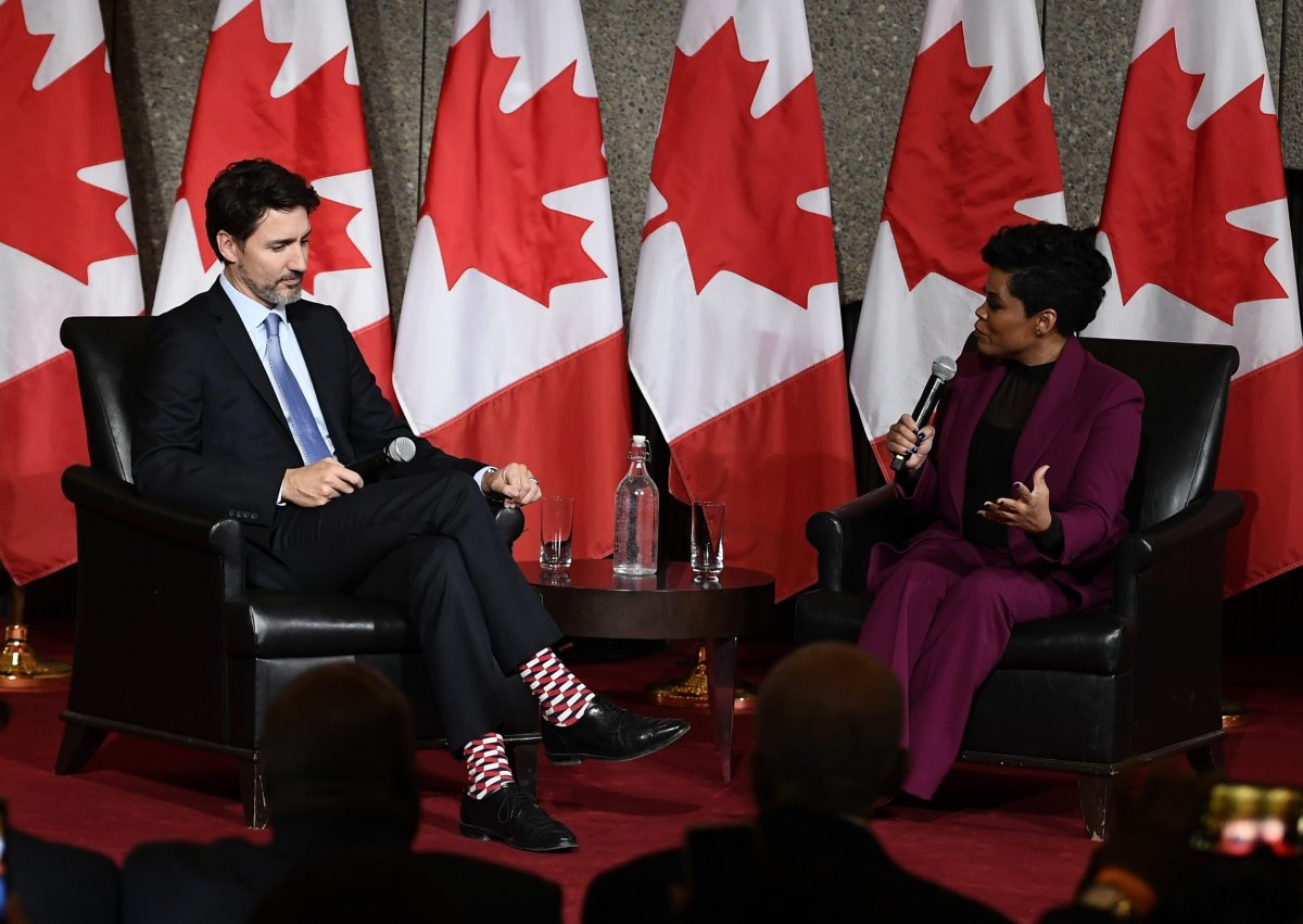 Prime Minister Justin Trudeau participates in a fireside discussion with broadcast journalist Marci Ien at a Black History Month reception at the National Arts Centre in Ottawa, on Monday, Feb. 24, 2020. 