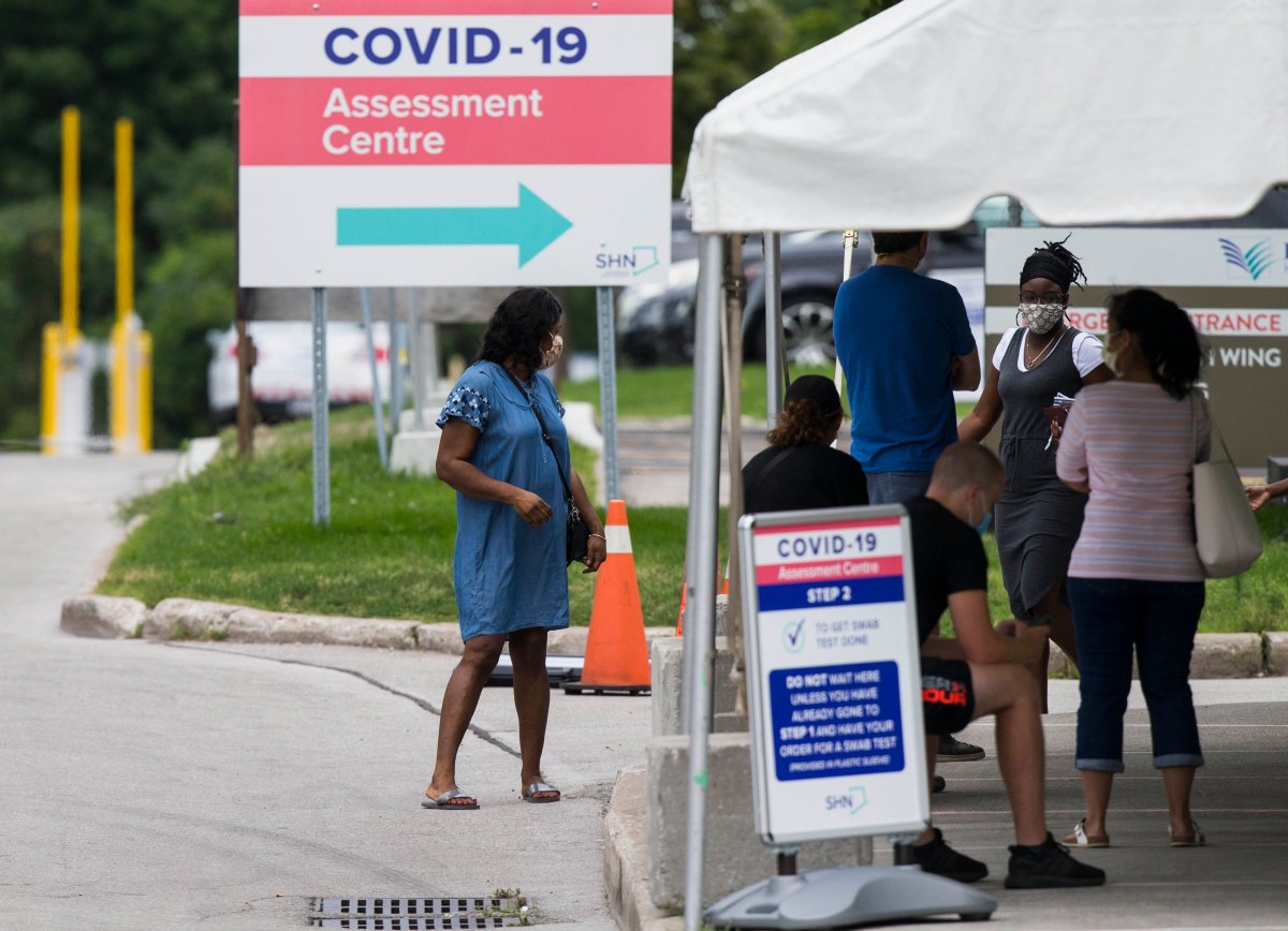 TORONTO, Aug. 11, 2020  People wearing face masks line up to have COVID-19 tests at a COVID-19 assessment center in Toronto, Canada, on Aug. 11, 2020. As of Tuesday evening, Canada reported 120,375 confirmed COVID-19 cases and 8,991 deaths, according to CTV. (Photo by Zou Zheng/Xinhua) (Credit Image: © Zou Zheng/Xinhua via ZUMA Press).