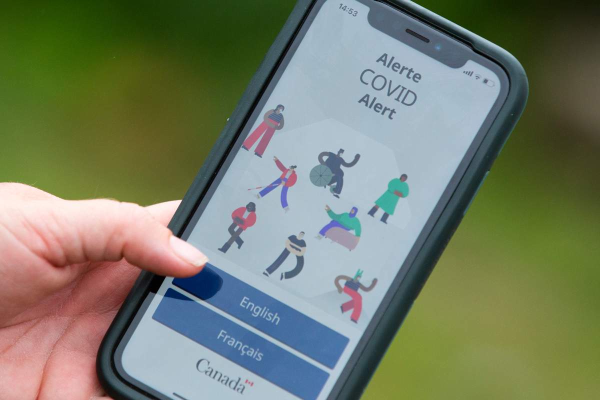 A person uses the COVID Alert app pictured on a cellphone in Kingston, Ont., on Thursday, Aug 27, 2020.
