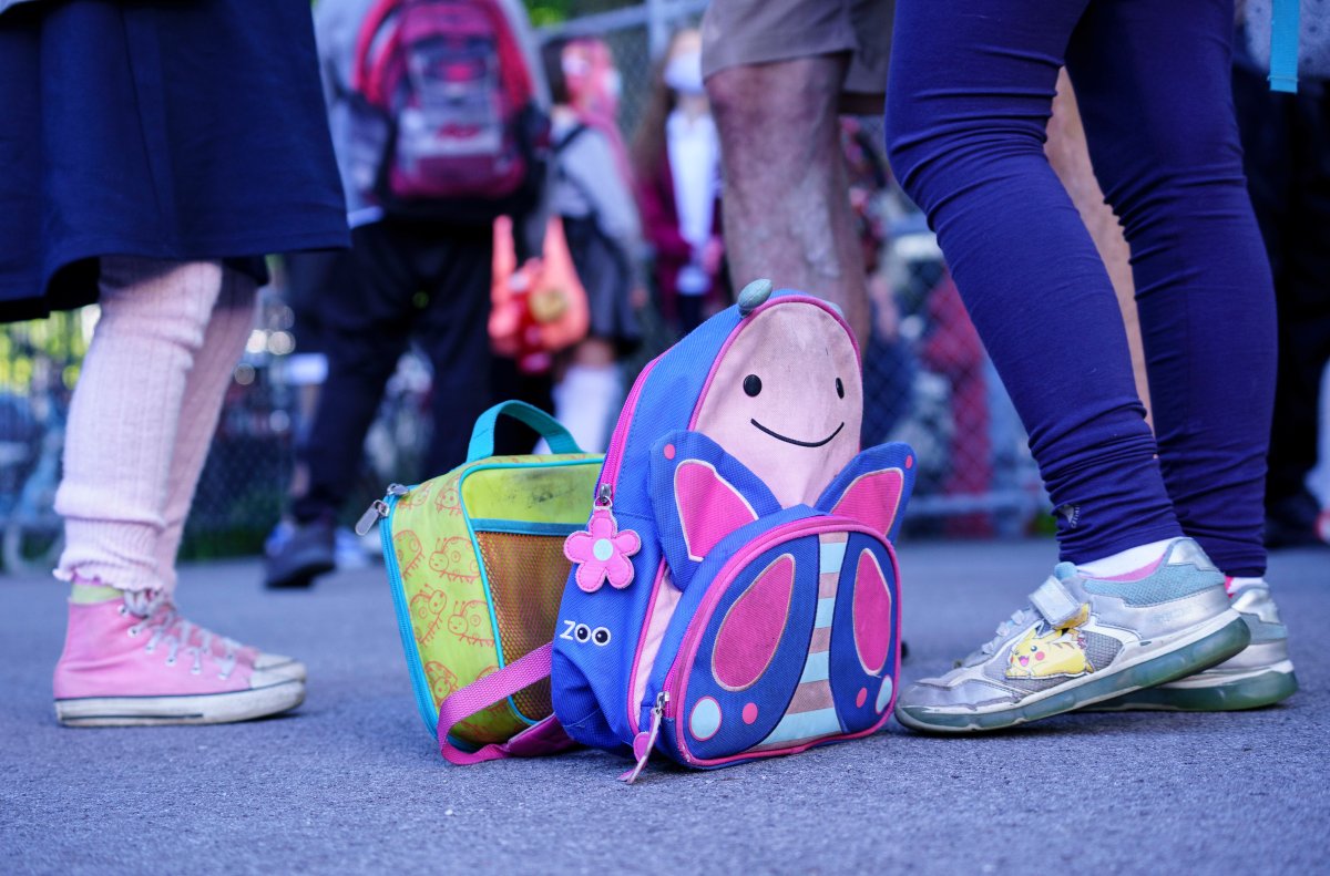 A school bag and a lunch bag are seen in the school yard at the Bancroft Elementary School as students go back to school in Montreal, on Monday, August 31, 2020. 