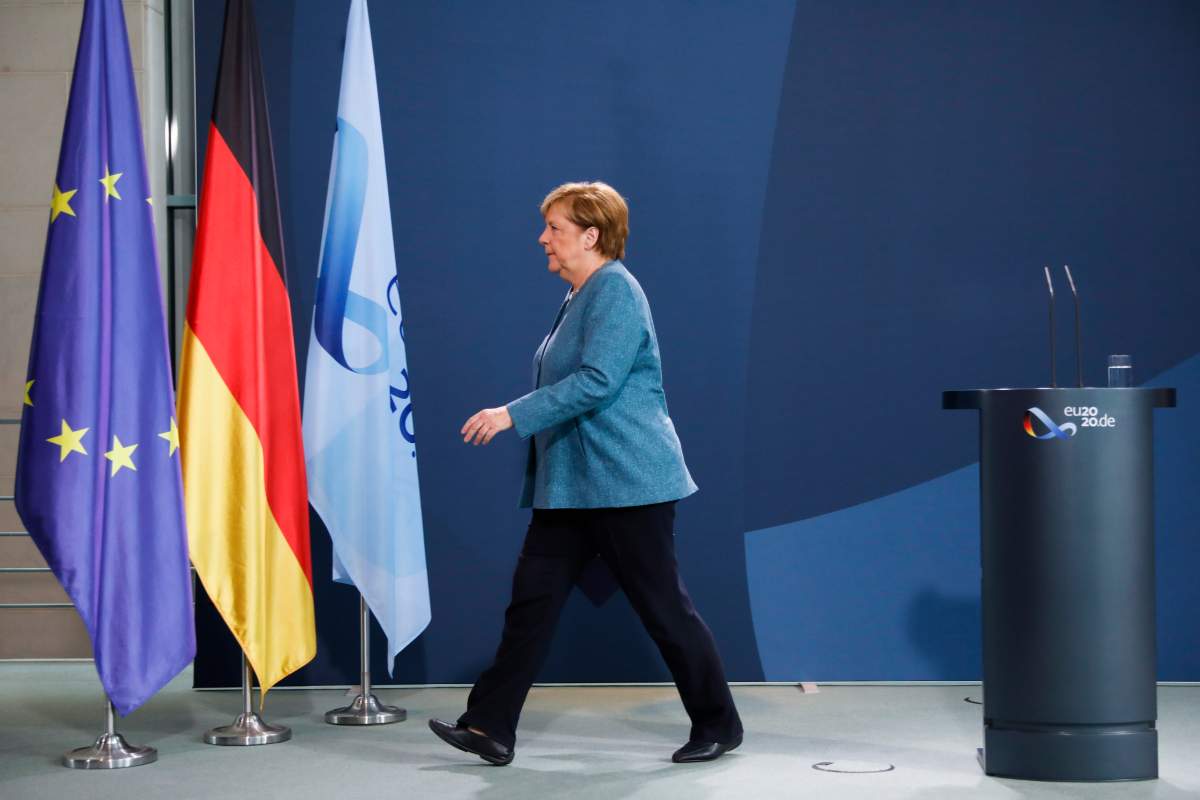 German Chancellor Angela Merkel leaves after a statement about latest developments in the case of Russian opposition leader Alexei Navalny at the chancellery in Berlin, Germany, Wednesday, Sept. 2, 2020.