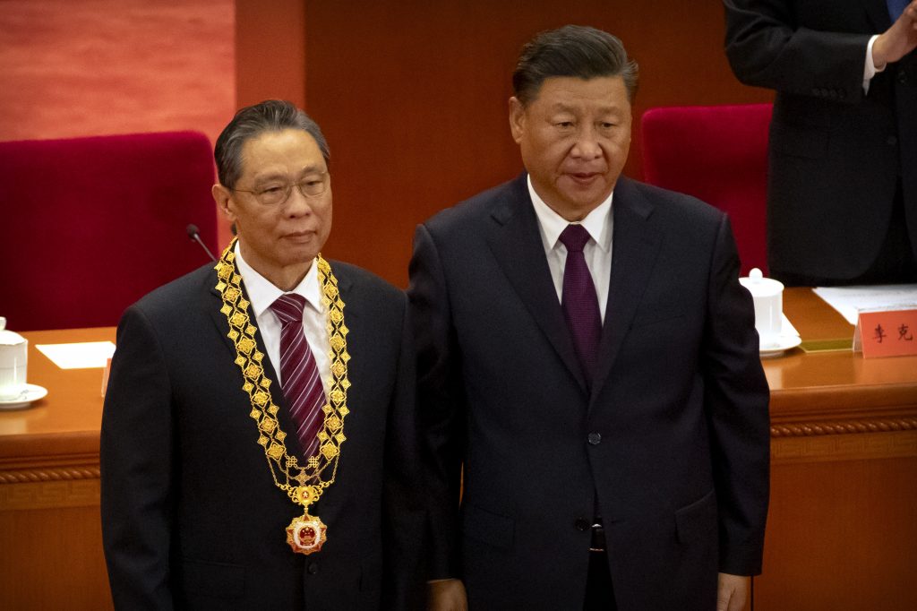Chinese President Xi Jinping, right, stands with Chinese medical expert Zhong Nanshan after awarding him a medal at an event to honor some of those involved in China's fight against COVID-19 at the Great Hall of the People in Beijing, Tuesday, Sept. 8, 2020. Chinese leader Xi Jinping is praising China's role in battling the global coronavirus pandemic and expressing support for the U.N.'s World Health Organization, in a repudiation of U.S. criticism and a bid to rally domestic support for Communist Party leadership. 