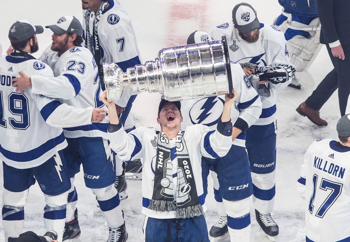 Tampa Bay Lightning's Ondrej Palat (18) hoists the Stanley Cup after defeating the Dallas Stars in Edmonton on Monday, September 28, 2020. 