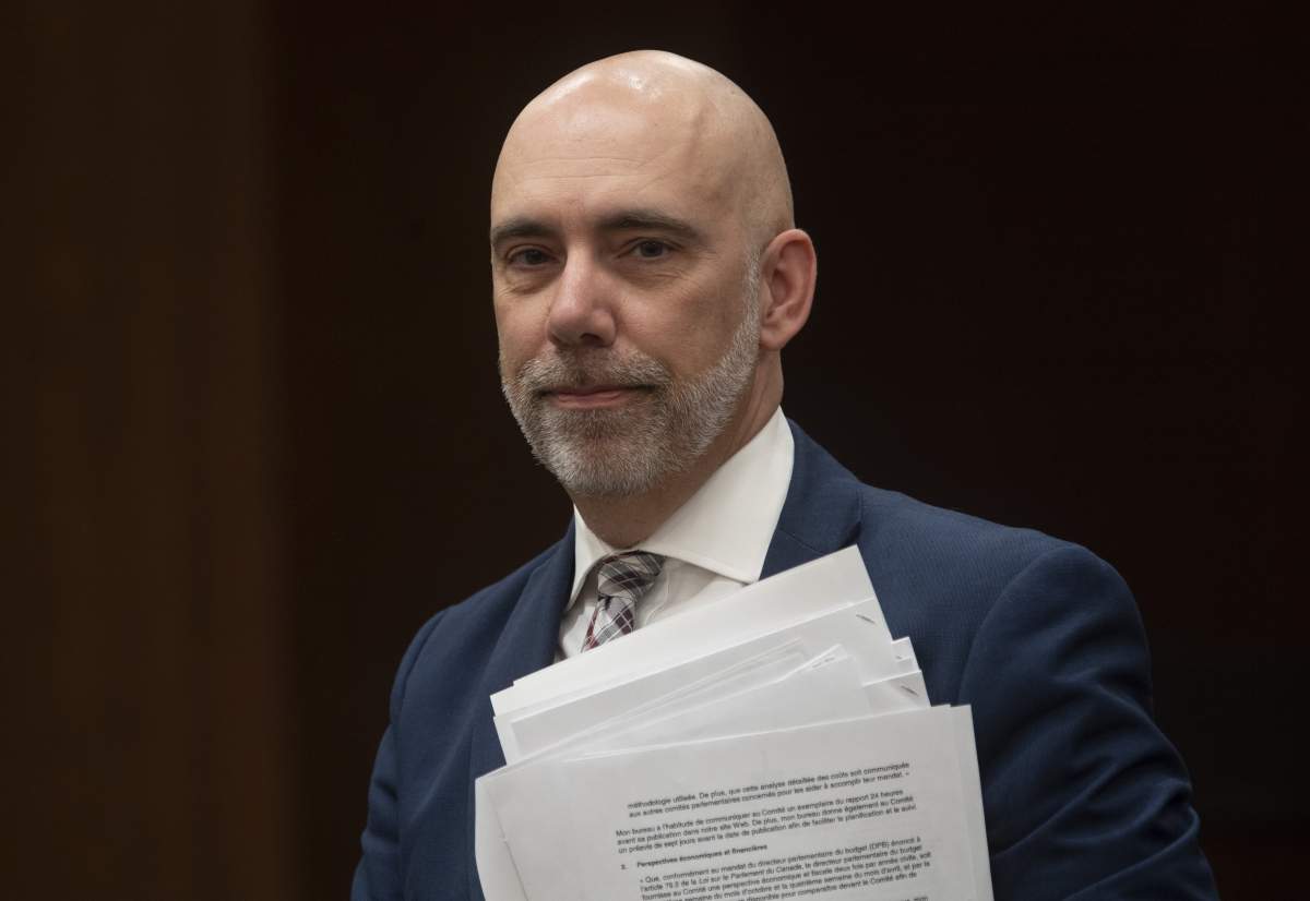 Parliamentary Budget Officer Yves Giroux waits to appear before the Commons Finance committee on Parliament Hill in Ottawa, Tuesday March 10, 2020. 