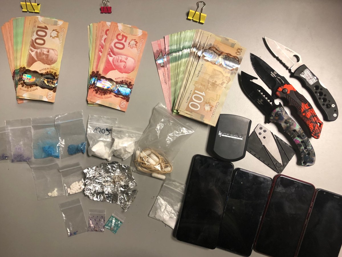 Drugs and prohibited knives were seized from a Port Hope residence on Monday. Two people were arrested.