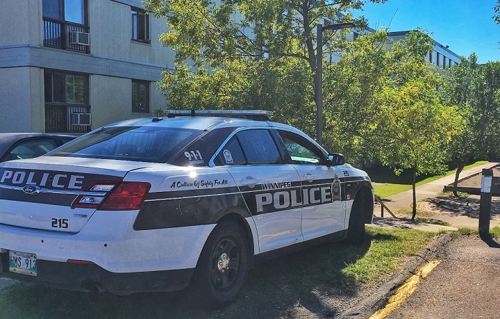 WPolice could be seen outside an apartment building on Dalhousie Drive in Winnipeg Friday afternoon.