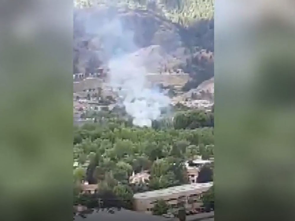 A man on a motorbike was arrested after trying to flee the fire scene on Wednesday morning, say Penticton RCMP.