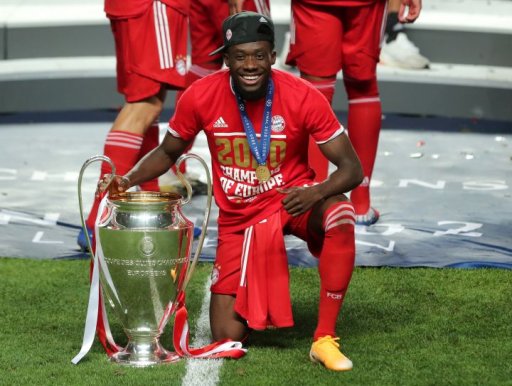 Alphonso Davies of FC Bayern celebrates with the trophy after winning the UEFA Champions League final between Paris Saint-Germain and Bayern Munich in Lisbon, Portugal, 23 August 2020.