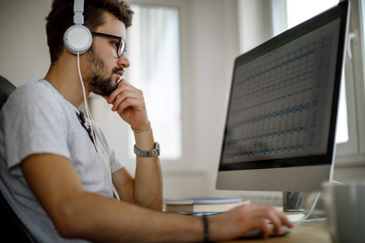 Young man studying at home