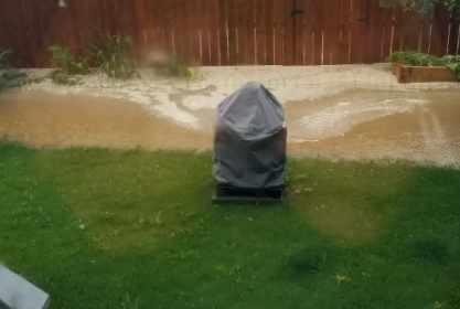 Flooding in the backyard of Don Czernick’s home in the west Edmonton community of Secord.