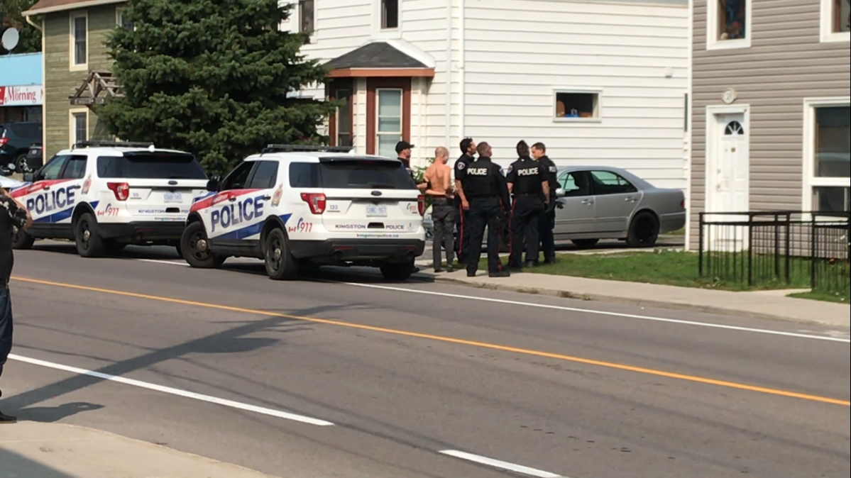 Kingston police arrested a man Tuesday afternoon after he allegedly threatened another man with a knife.