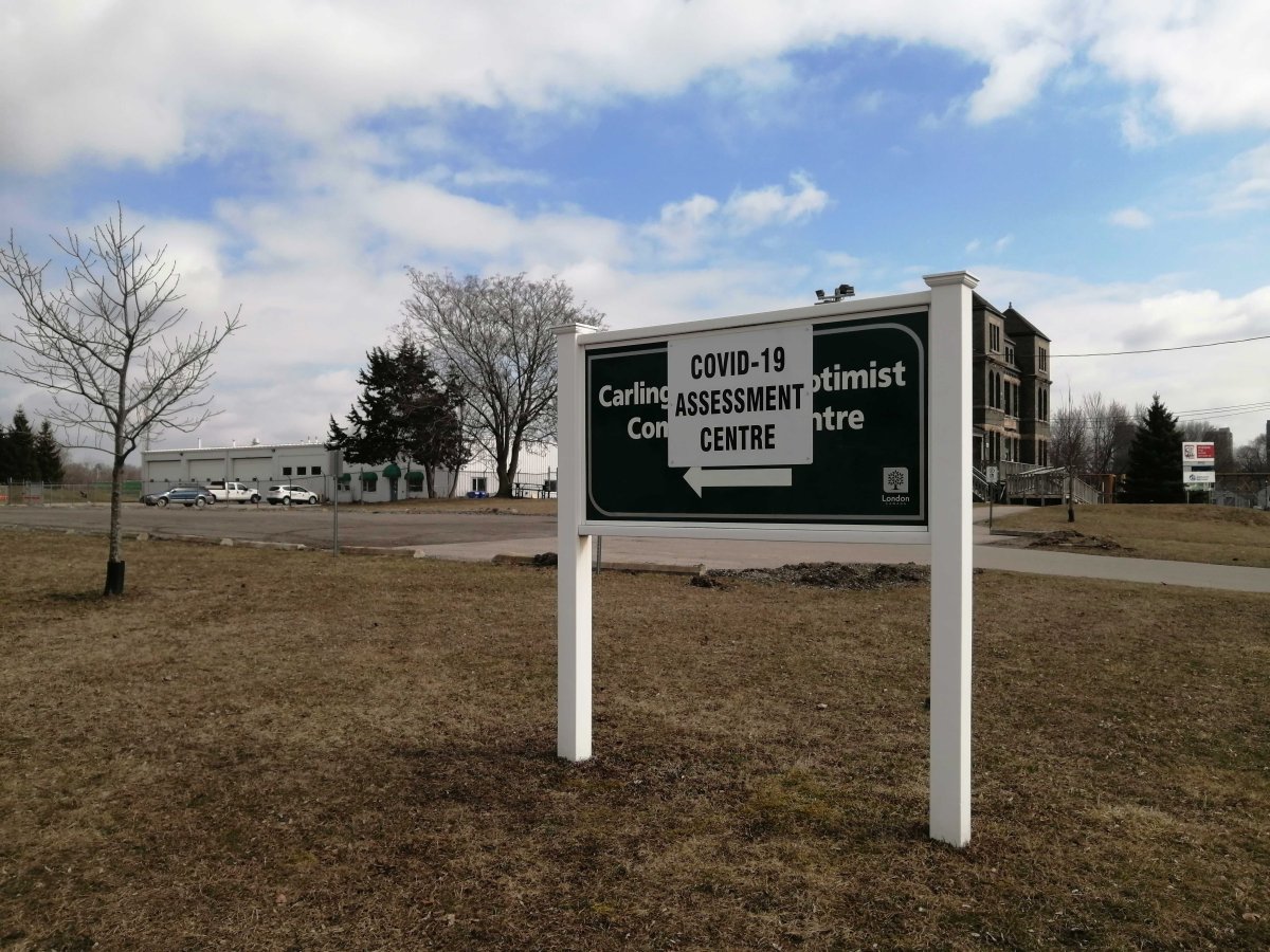 A sign directing the public to the Carling Heights COVID-19 Assessment Centre in London, Ont.