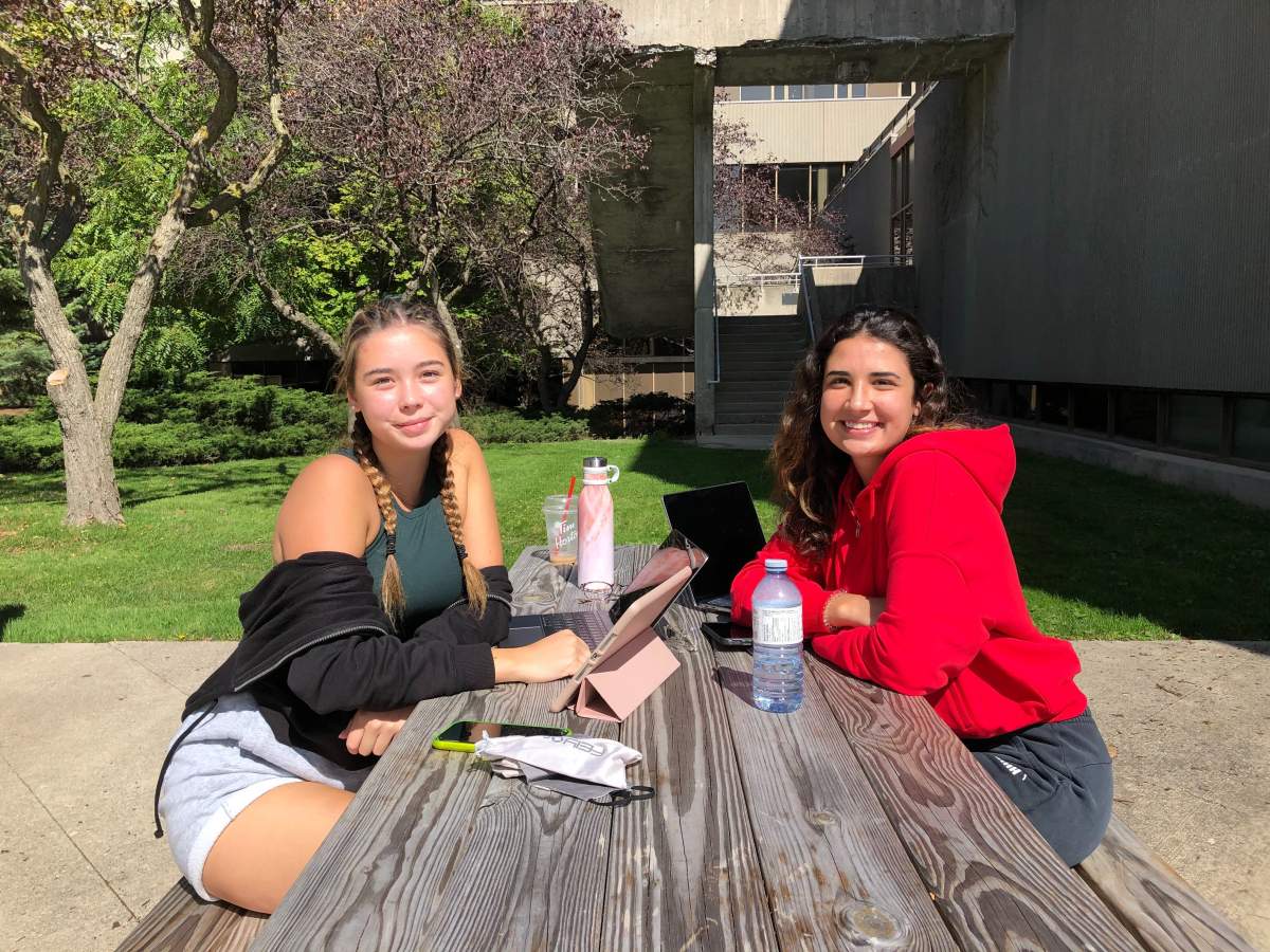 First year students Arika Lee (left) and Gaby Jamieson say they’ve been following COVID-19, but worry about others who may not be on the same page.