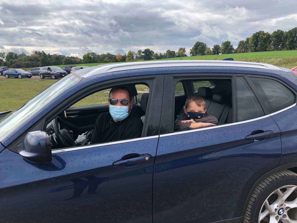 Michael Powers and his son Chase ventured out to Dorchester after seeing a long line at an assessment centre in London.