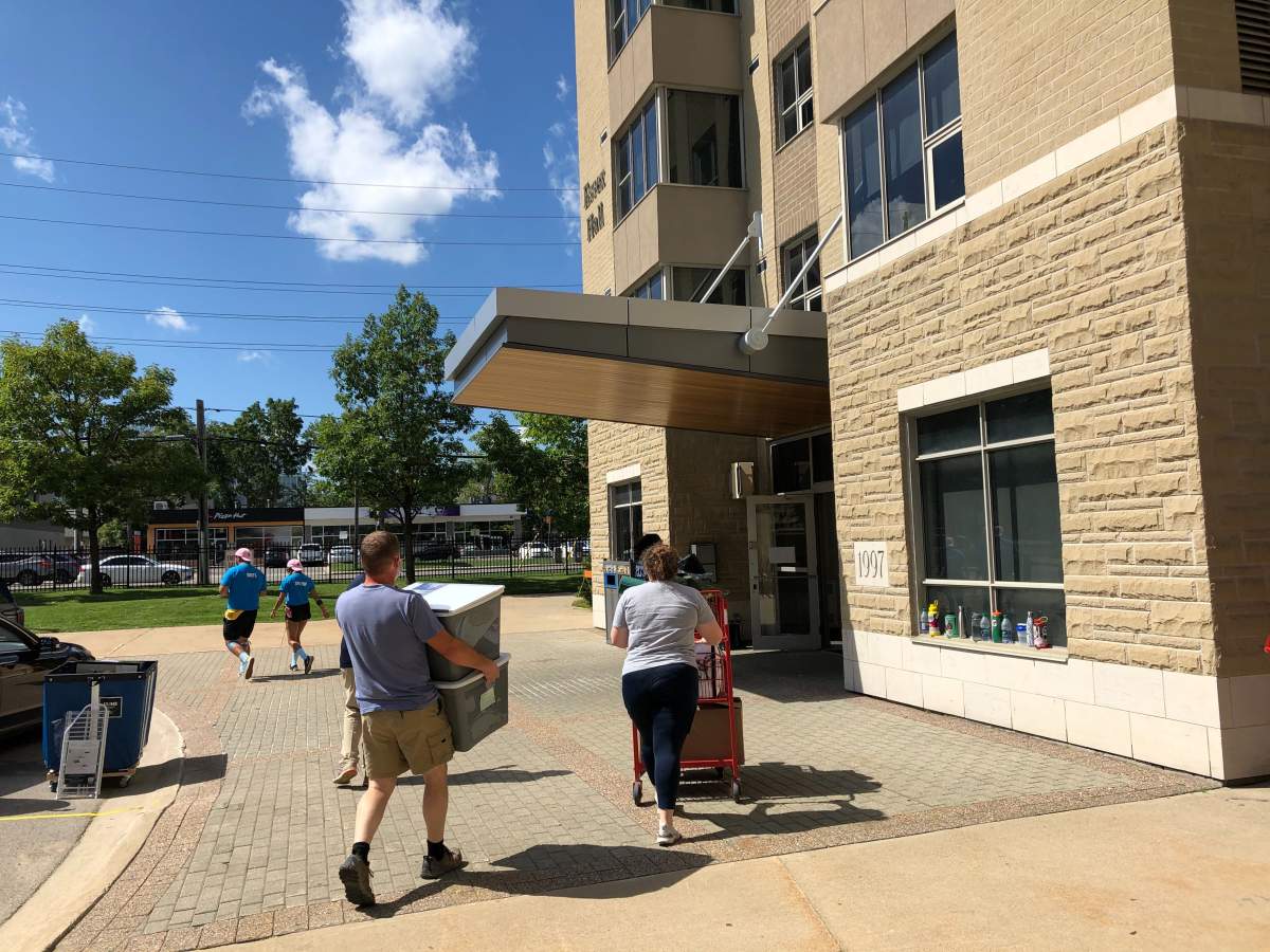 A socially distanced move-in takes place at Western University's Essex Hall in September 2020.