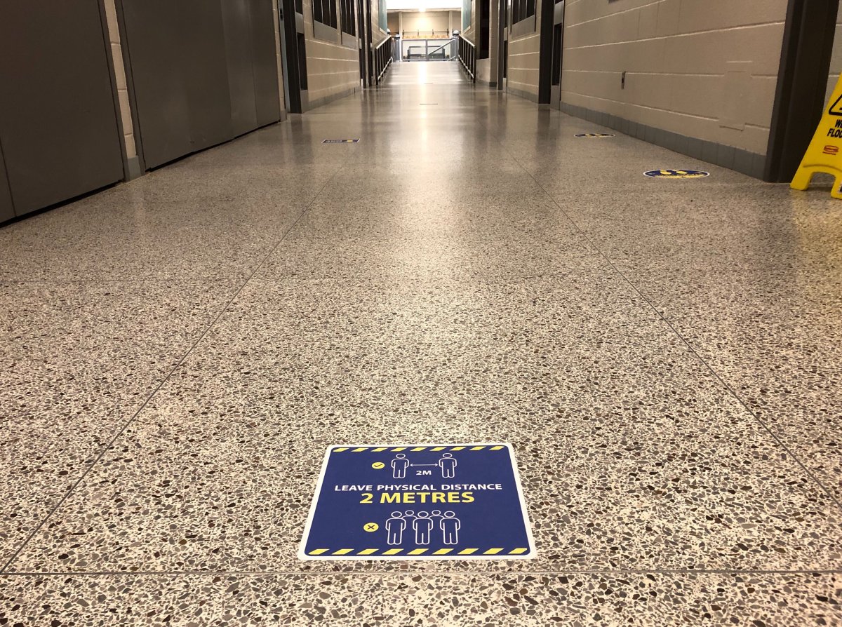 An example of physical distancing signage placed inside the halls of Bonaventure Meadows Public School.