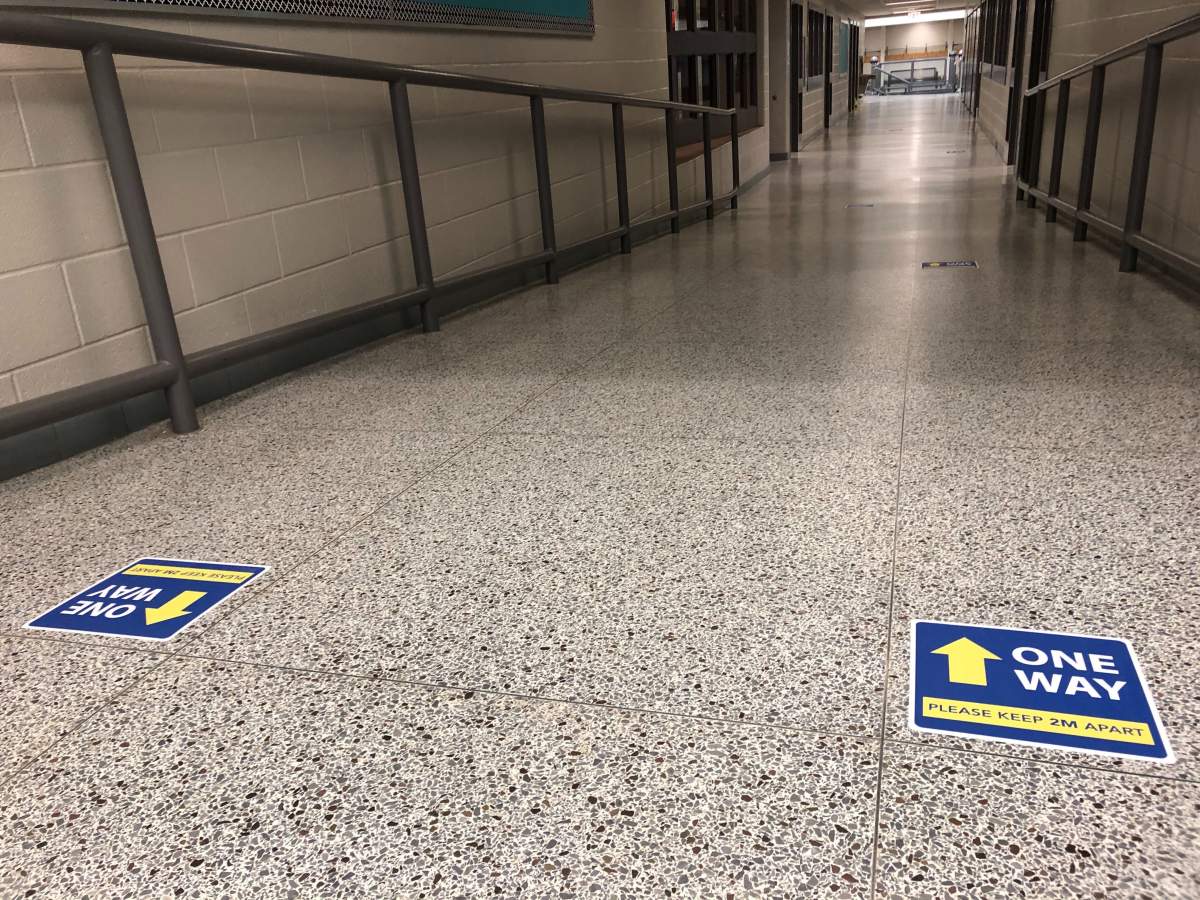 By directing the flow of traffic, these signs aim to reduce congestion in hallways at Bonaventure Meadows.