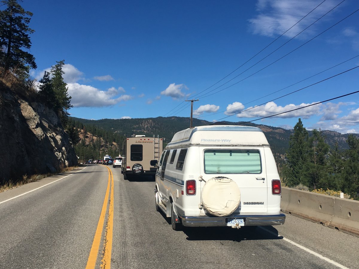Traffic came to a halt  on Highway 97 Sunday afternoon south of Peachland following a crash involving a motorcycle and pickup truck. 