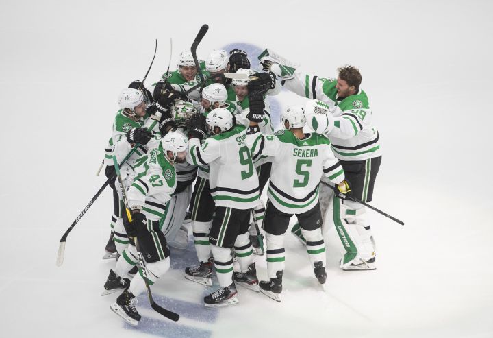 Dallas Stars players celebrate their overtime win over the Vegas Golden Knights in the NHL Western Conference final in Edmonton on Monday, September 14, 2020.