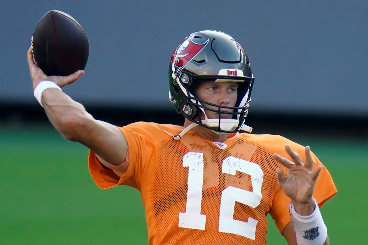 Tampa Bay Buccaneers quarterback Tom Brady (12) throws a pass during an NFL football training camp practice Friday, Aug. 28, 2020, in Tampa, Fla.