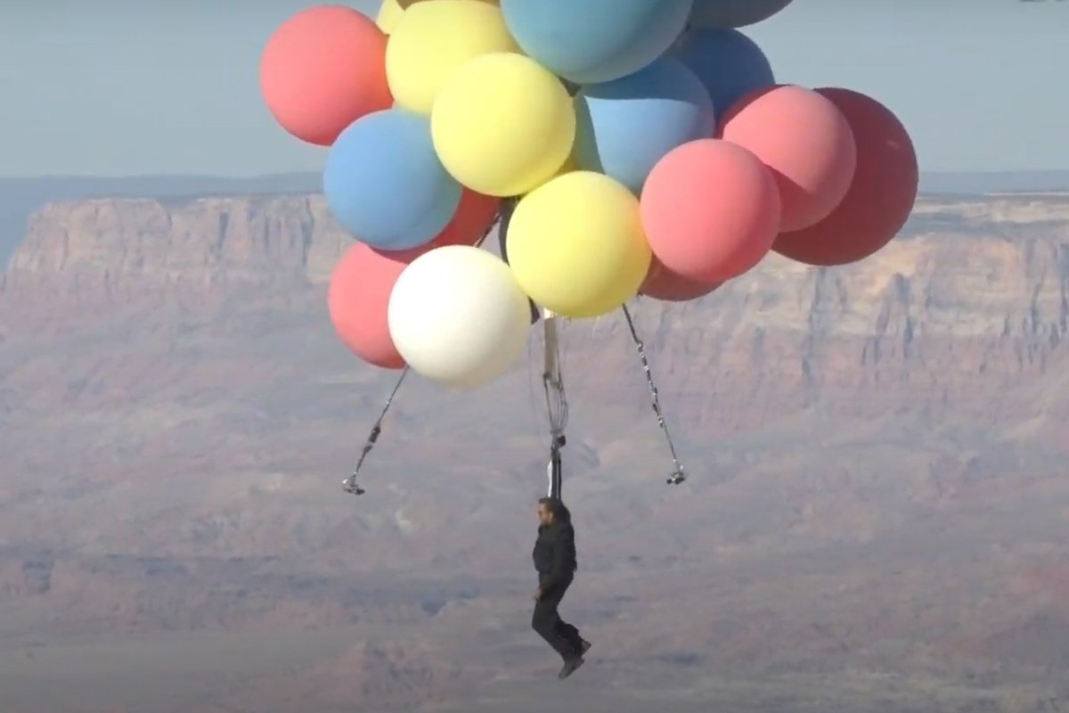 Illusionist David Blaine soars over the desert in Arizona on a balloon rig on Sept. 2, 2020.