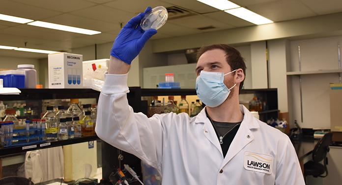 Brendan Daisley, a PhD candidate at Western University’s Schulich School of Medicine & Dentistry, conducting research at Lawson Health Research Institute.