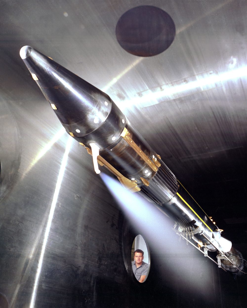 This 1963 photograph shows vent flowing cryogenic fuel and T/C Rake mounted on a 1/10 scale model Centaur rocket in the Supersonic Wind Tunnel at the Glenn Research Center.