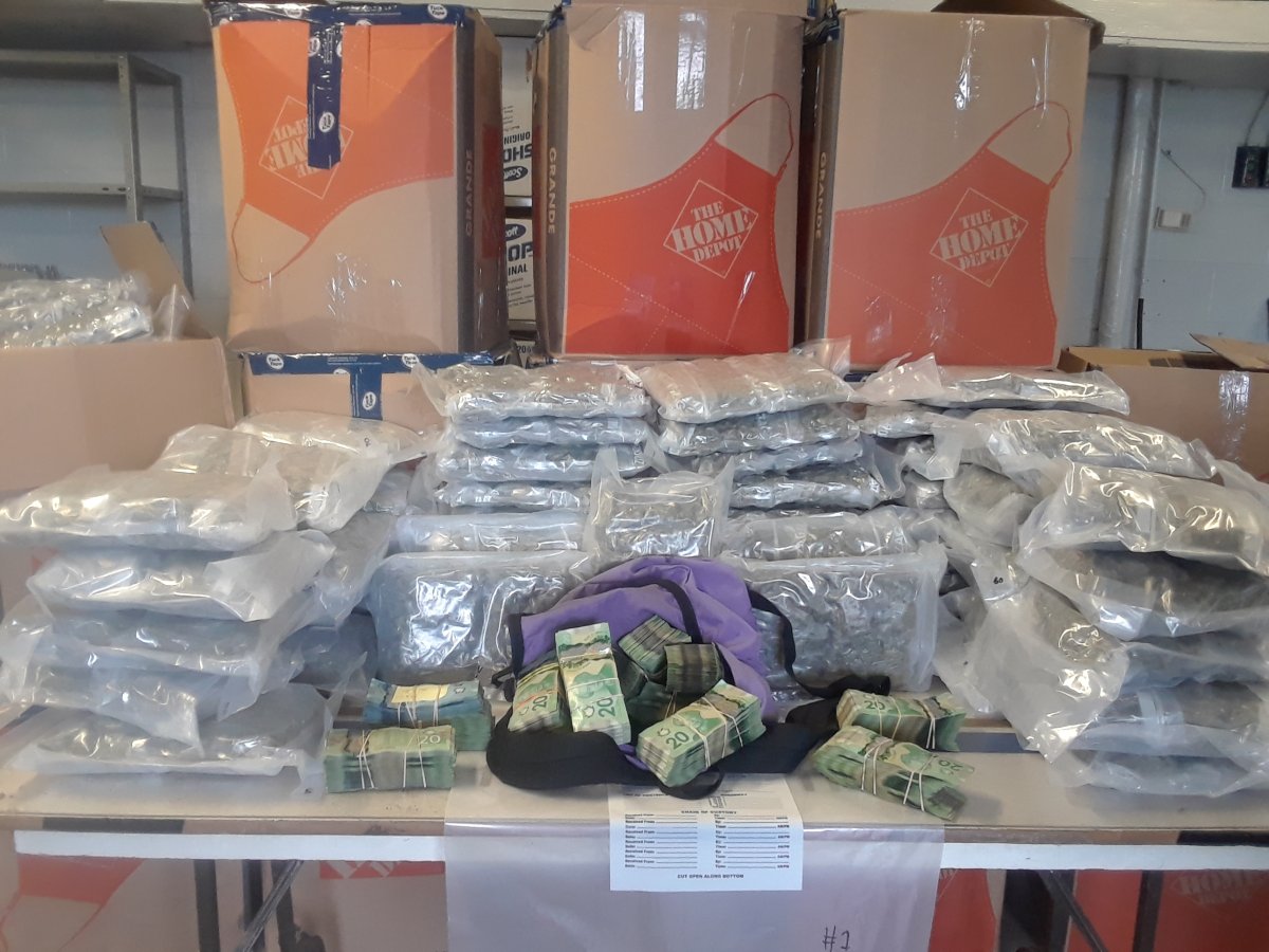 OPP say they seized some $802,000 in dried, packaged cannabis, and about $130,000 in Canadian cash.
