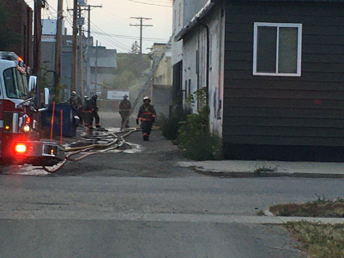 The commanding battalion chief ordered all firefighters to exit a commercial structure when the fire escalated.