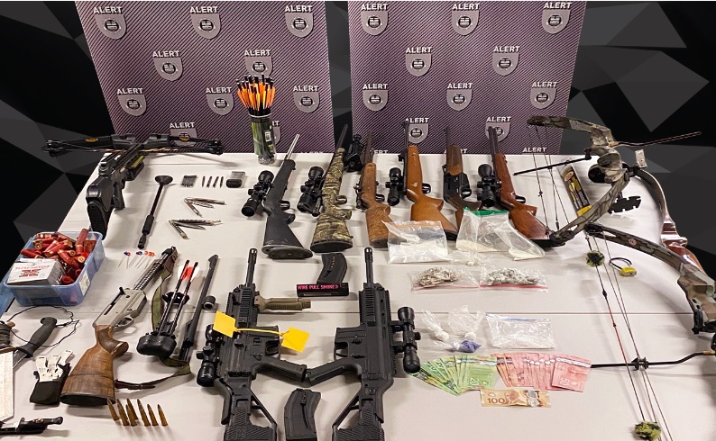 Firearms, crossbows and about $21,000 worth of drugs and cash were seized following the search of a rural property in Cypress County, Alta., on Sept. 4, 2020.