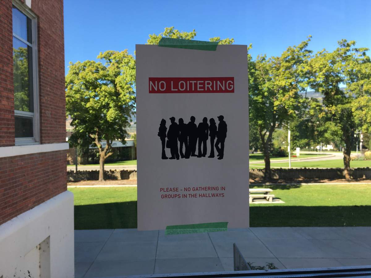 No loitering and physical distancing signage is plastered around Pen High.
