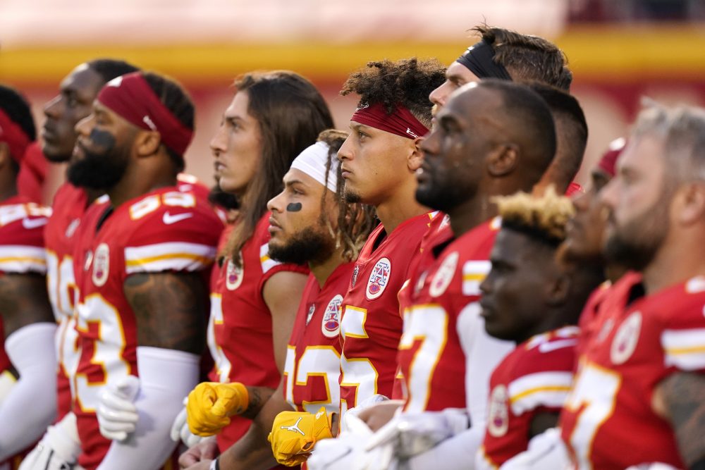 Boos, jeers interrupt NFL players’ moment of silence for racial