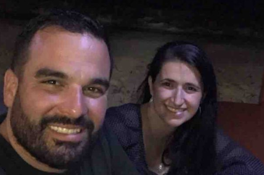 Joseph Roland, left, and his wife Josslin are shown in this handout photo.