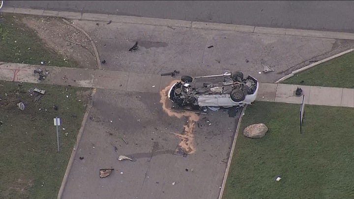 An aerial photo of the car on its roof on McLevin Avenue, east of Markham Road in Scarborough.