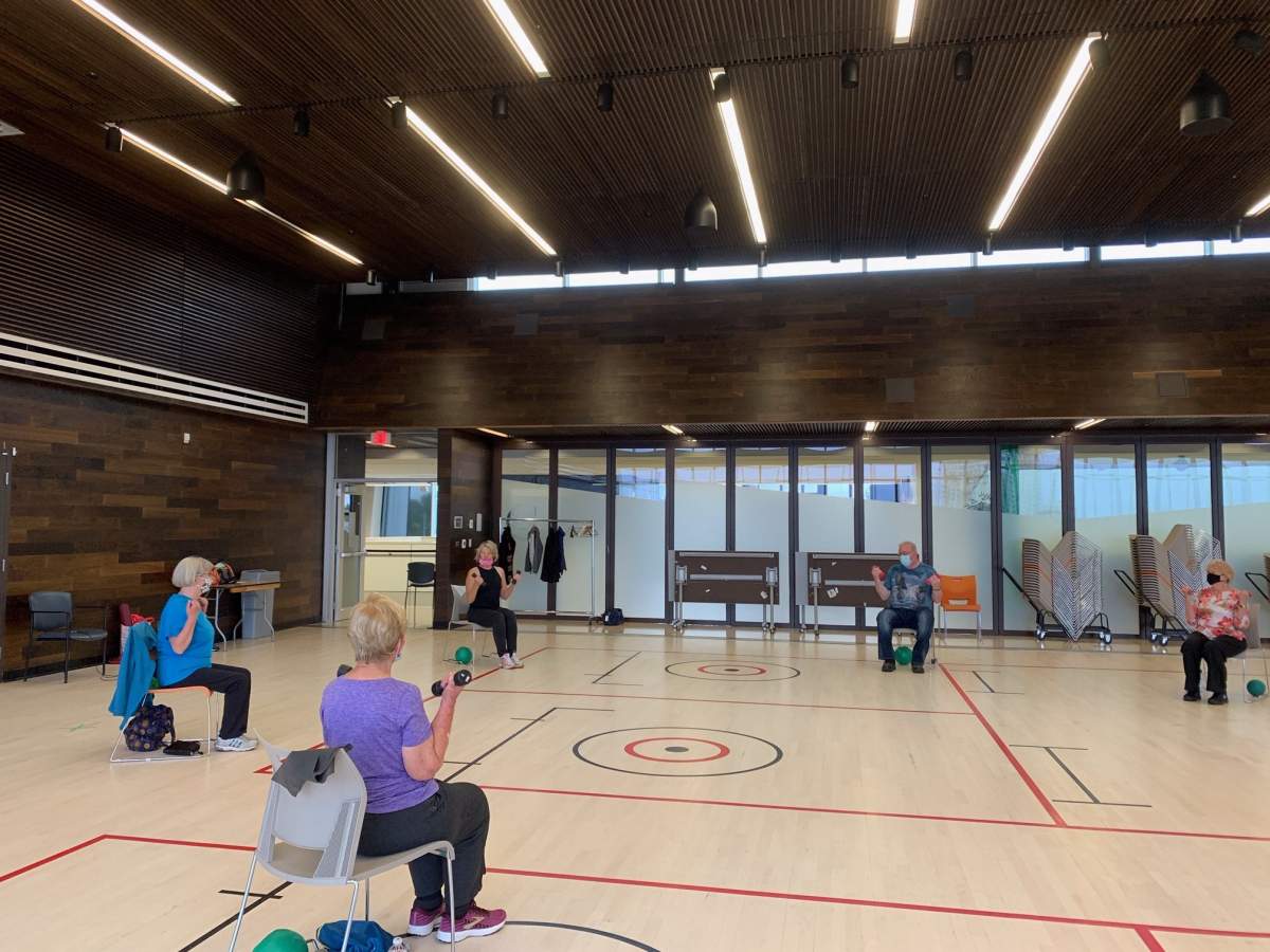 Seniors exercise in the 'Strong and Able' class at the newly reopened Mill Woods Seniors Association.