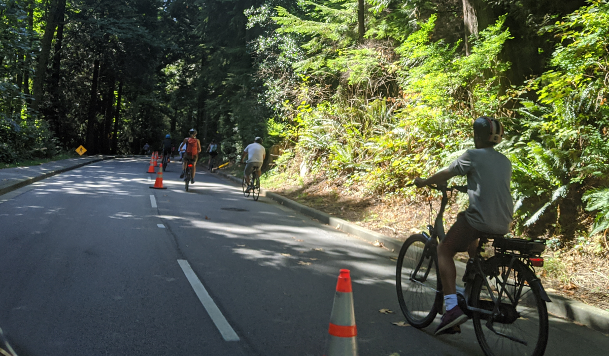 Cyclists ride on a separated bike lane in Stanley Park on Monday, Sept. 7, 2020. 