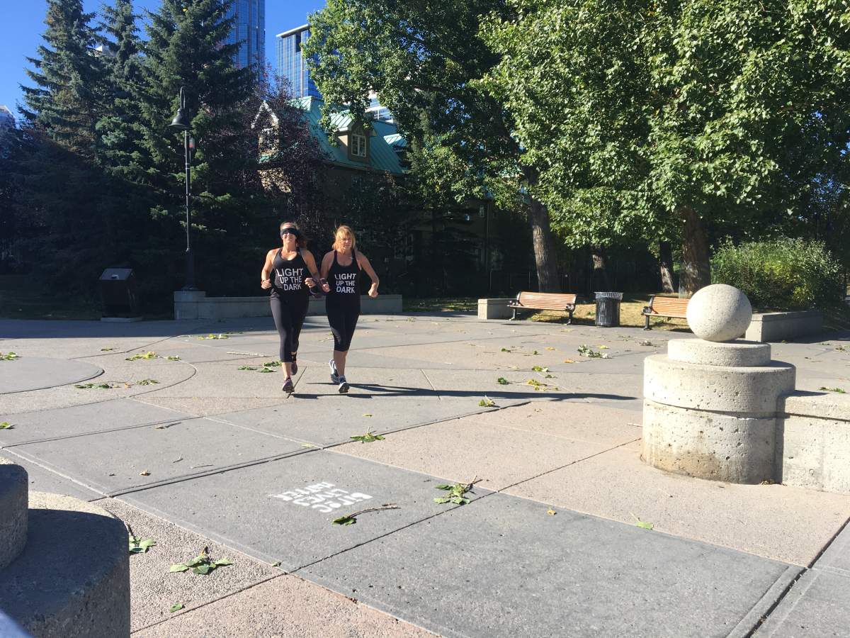 Stephanie and Jan running through Eau Claire.